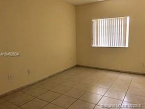 7320 NW 114th Ave-Unit -Unit105 in Doral, FL - Building Photo - Building Photo