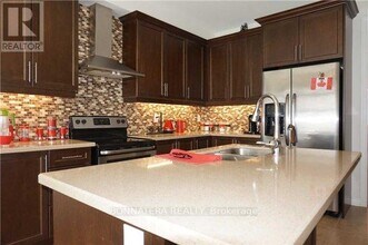 230 Jessie Caverhill Pass in Oakville, ON - Building Photo - Building Photo