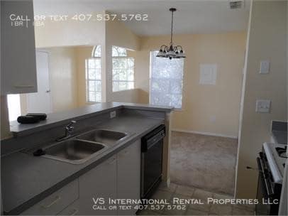 1606 Columbia Arms Cir-Unit -Unit 224 in Kissimmee, FL - Building Photo - Building Photo