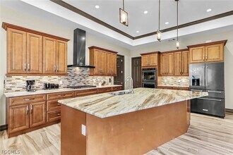 6142 Calusa Rdg Trl in Bokeelia, FL - Foto de edificio - Building Photo