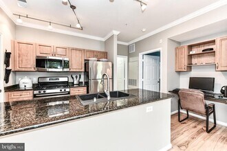12921 Centre Park Cir-Unit -205 in Herndon, VA - Building Photo - Building Photo