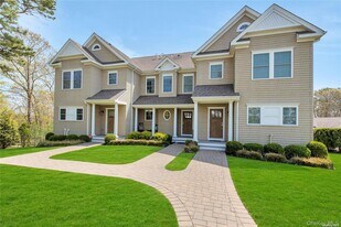 20 Canoe Place Rd in Hampton Bays, NY - Building Photo