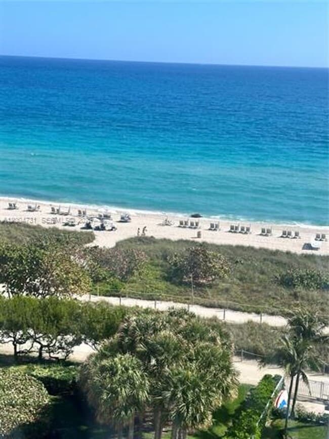 property at 9511 Collins Ave