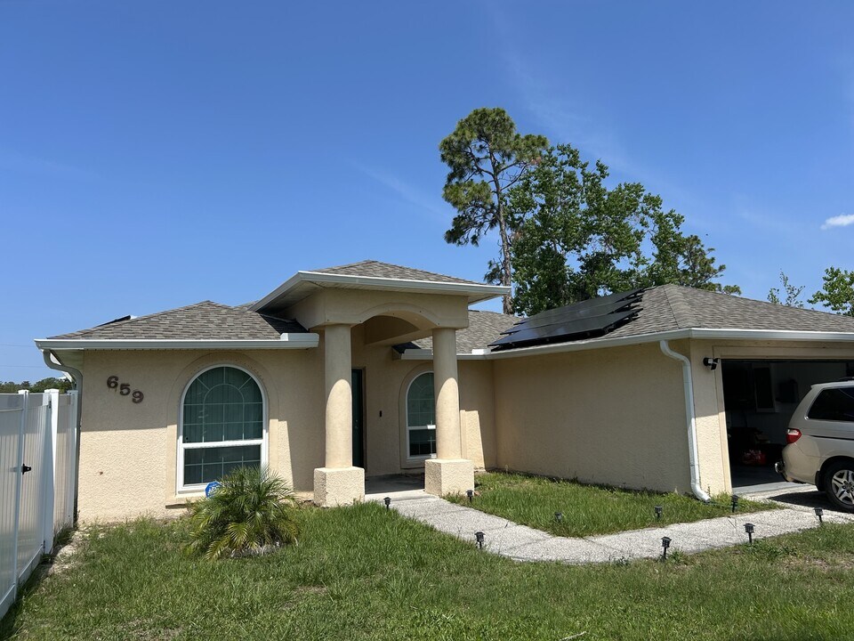 659 Jaguar Ct in Poinciana, FL - Building Photo