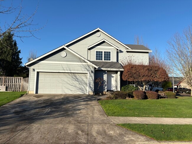 property at 1925 NW Woodland Dr