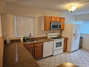 8380 Sands Point Blvd in Tamarac, FL - Building Photo - Building Photo