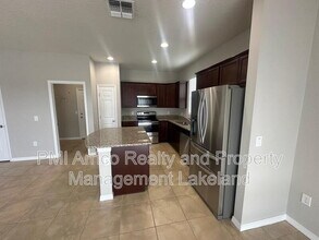 8739 Micmac Ct in Polk City, FL - Building Photo - Building Photo