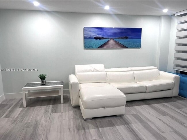 property at 6917 Collins Ave