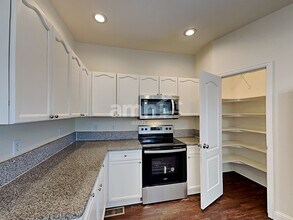 10439 Vaughn Way in Commerce City, CO - Building Photo - Building Photo