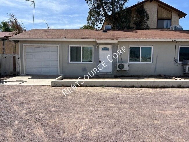 property at 411 S 1st Ave