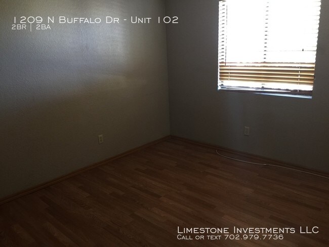 1209 N Buffalo Dr-Unit -Unit 102 in Las Vegas, NV - Building Photo - Building Photo
