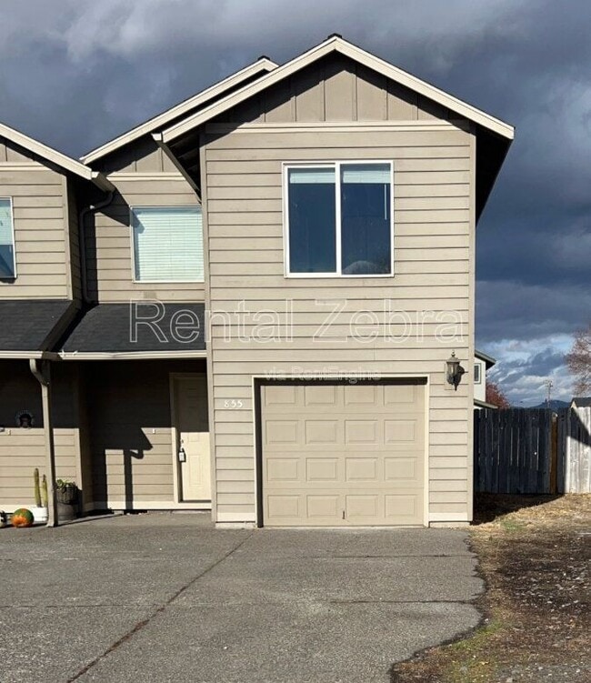 property at 855 NE Larch Ave