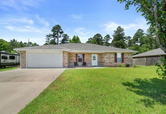 property at 122 Mayhaw St