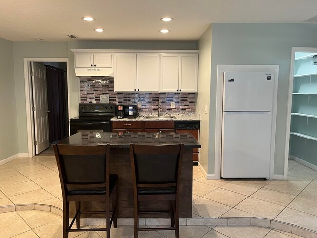 491 SW Curtis St in Port St. Lucie, FL - Building Photo - Building Photo