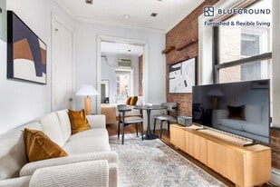 52 Barrow St, Unit FL1-ID2123 in New York, NY - Building Photo
