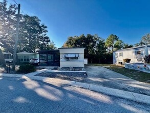 825 Oakwood Dr in Tarpon Springs, FL - Building Photo - Building Photo