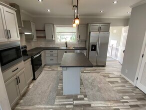 1990 Douglas Ln in Tarpon Springs, FL - Building Photo - Building Photo