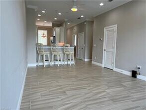 15114 Palmer Lake Cir-Unit -202 in Naples, FL - Building Photo - Building Photo