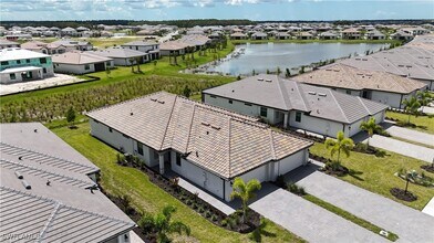 19597 Hinkley Dr in Estero, FL - Building Photo - Building Photo