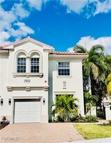 7033 Ambrosia Ln in Naples, FL - Building Photo