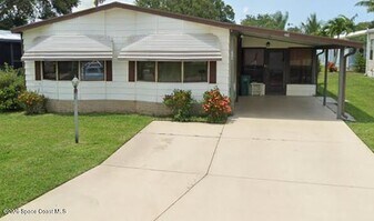259 S Dolphin Cir in Micco, FL - Building Photo