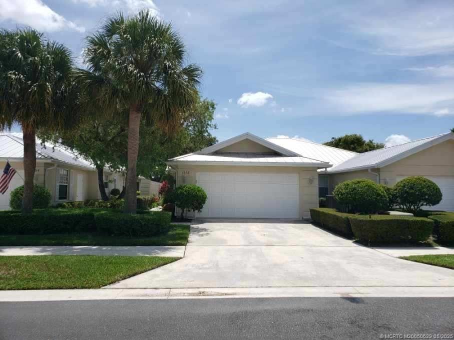 1652 SW Waterfall Blvd in Palm City, FL - Building Photo