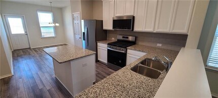 640 Pepperbark Loop in Mustang Ridge, TX - Building Photo - Building Photo