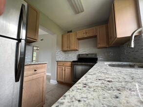 1883 Breezy Ln in West Palm Beach, FL - Building Photo - Building Photo