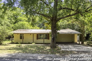 18218 Scenic Loop Rd in Helotes, TX - Building Photo