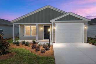 7661 CHERYL Ct in Okahumpka, FL - Building Photo - Building Photo