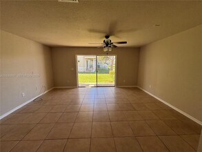 5907 Abbey Rd in Tamarac, FL - Building Photo - Building Photo
