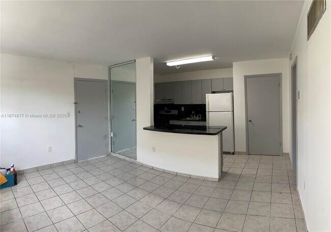 property at 465 S Royal Poinciana Blvd