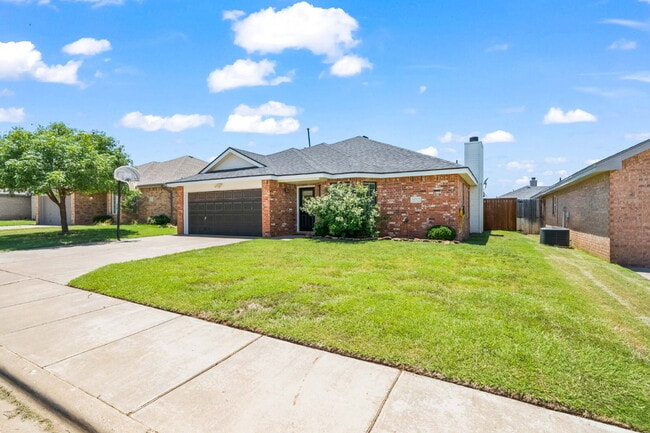 property at 10702 Akron Ave