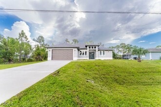 920 Washington Ave in Lehigh Acres, FL - Building Photo - Building Photo