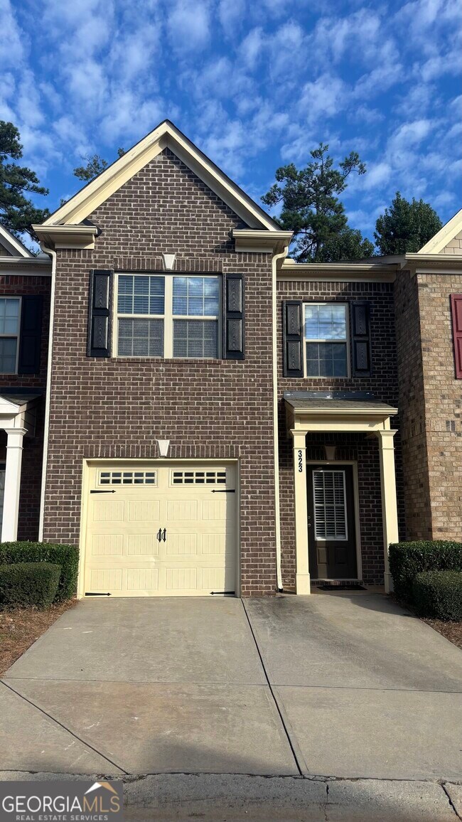 property at 323 Knelston Oak Dr NE