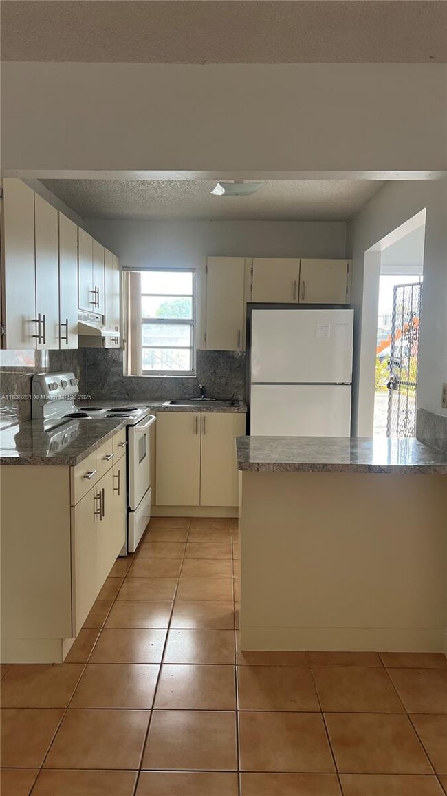 property at 120 W 9th St