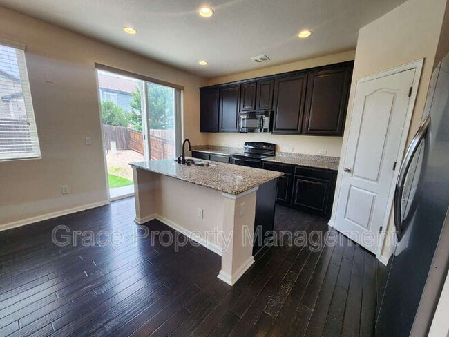 9741 Mobile St in Commerce City, CO - Building Photo - Building Photo