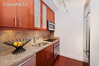 80 John St, Unit 14A in New York, NY - Building Photo - Building Photo