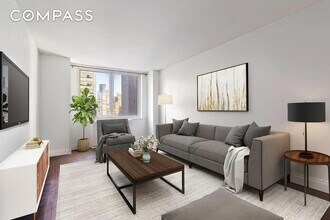 212 E 47th St, Unit 21D in New York, NY - Foto de edificio - Building Photo