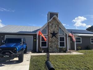 property at 1297 SE Floresta Dr