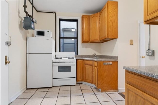 property at 61 E 3rd St