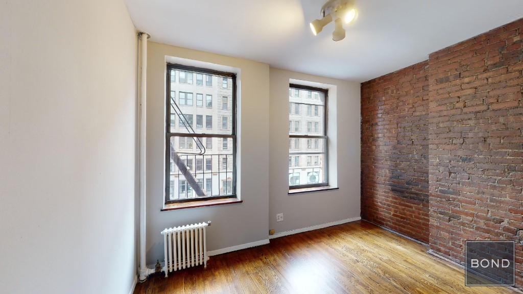 221 E 23rd St in New York, NY - Building Photo