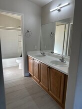 8668 Tomnitz Ave in Las Vegas, NV - Building Photo - Building Photo