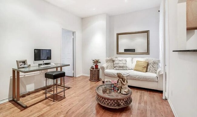property at 327 E 3rd St