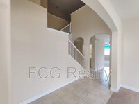 1315 Moss Creek Ln in Champions Gate, FL - Foto de edificio - Building Photo