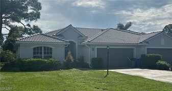 26992 Spanish Gardens Dr in Bonita Springs, FL - Building Photo