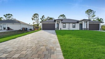 706 Homer Ave S in Lehigh Acres, FL - Building Photo