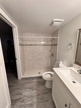 6040 Lace Wood Cir in Atlantis, FL - Building Photo - Building Photo