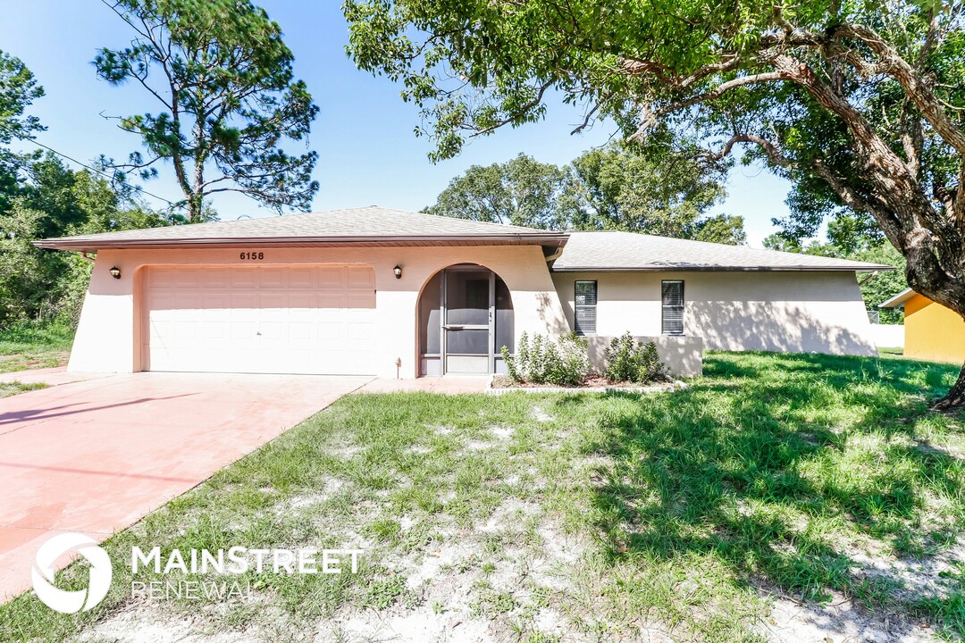 6158 Sunday Rd in Spring Hill, FL - Building Photo