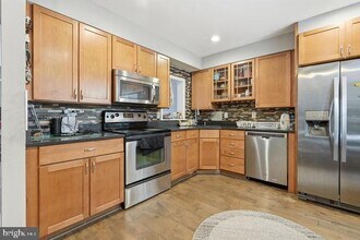 87 Sudbury Square in Sterling, VA - Building Photo - Building Photo